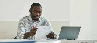 Signing an installment loan application form